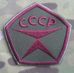 Знак качества СССР (H50). Показан на фоне цвета мультикам.